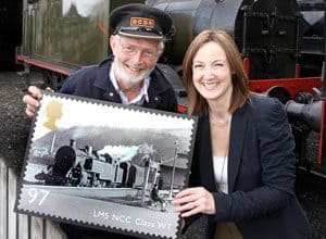 DCDR volunteer Philip McKinstry and the Royal Mail’s Barbara Roulston launch the Great British Railways series of stamps in Downpatrick, in front of GSWR No. 90 Photo: Chris Halpin, Mourne Observer